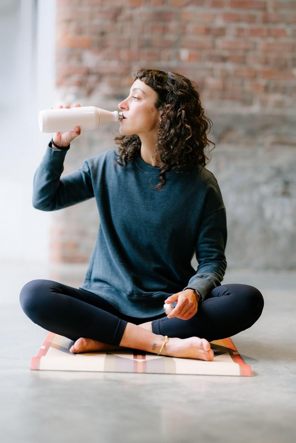 Stanley All Day Slim Bottle 20 oz | Twist off Lid with Leakproof Seal | Slim Design for Travel and Gym | Insulated Stainless Steel Water Bottle | BPA-Free | Garnet Shine