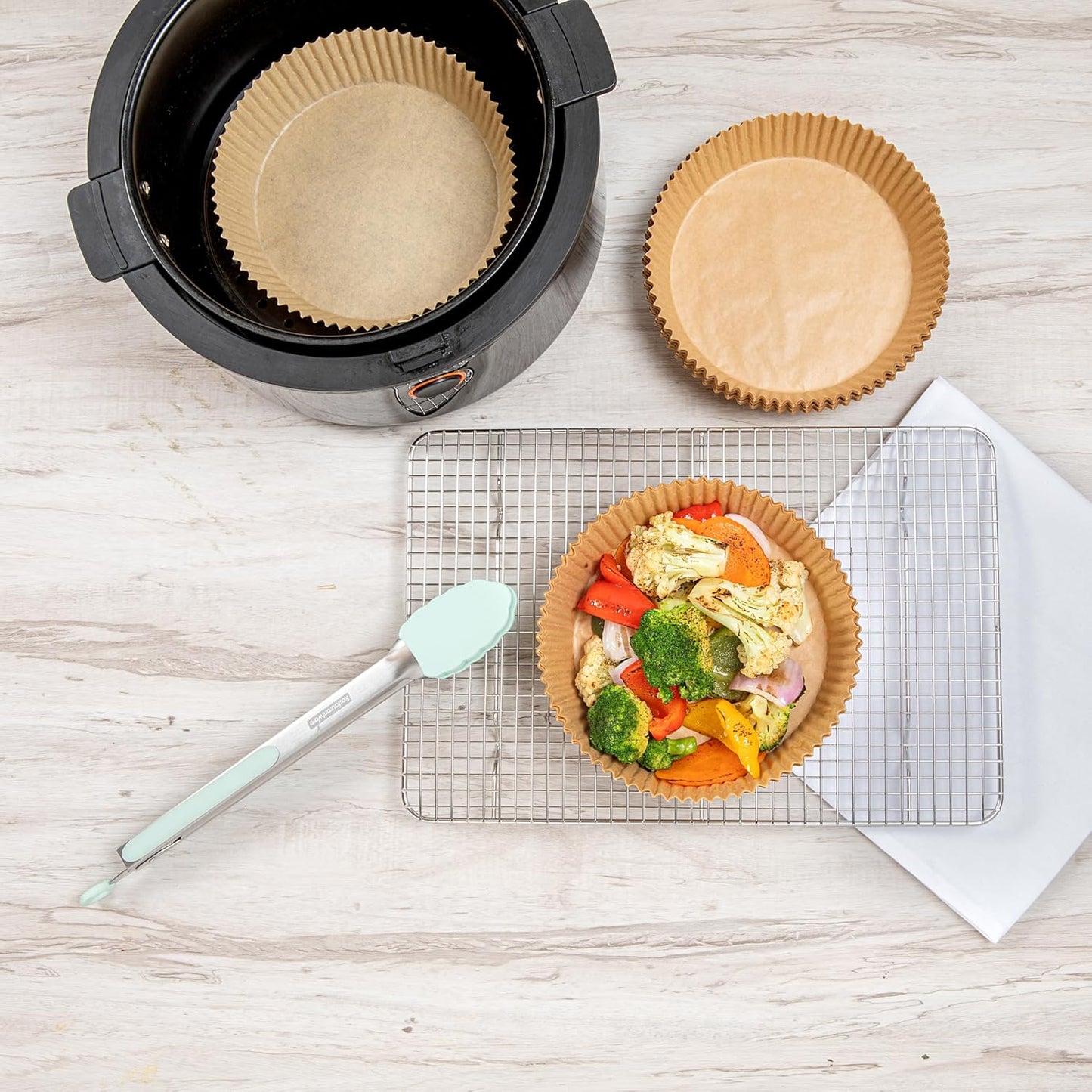 Restaurantware-Pastry Tek 6.3 x 6.3 x 1.8 Inch Air Fryer Liners, 100 Round Air Fryer Baskets - No-Stick Silicone Coating, Unbleached, Food-Grade Paper Liners, For Steamer, Microwave, Oven, Fry Pan